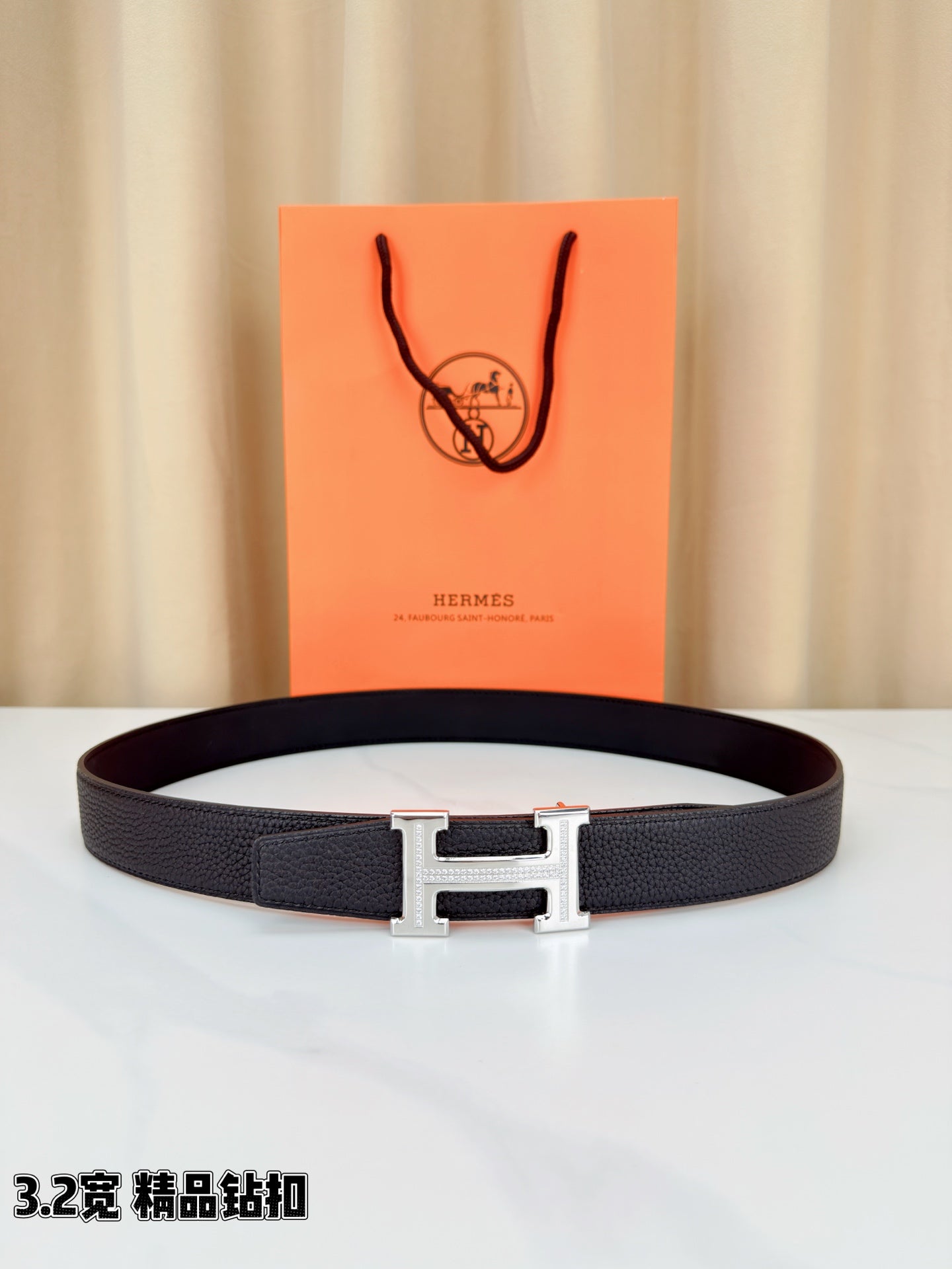 Hermes belt in dark textured leather with silver-tone H buckle