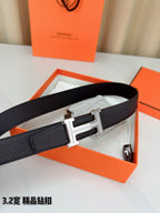 Hermes belt with dark leather strap and silver-tone square H buckle