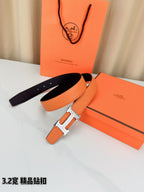 Hermes H-buckle belt, orange leather with silver buckle and matching keeper strap