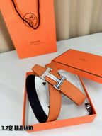 Hermes H-buckle belt, orange leather with silver H buckle and open keeper