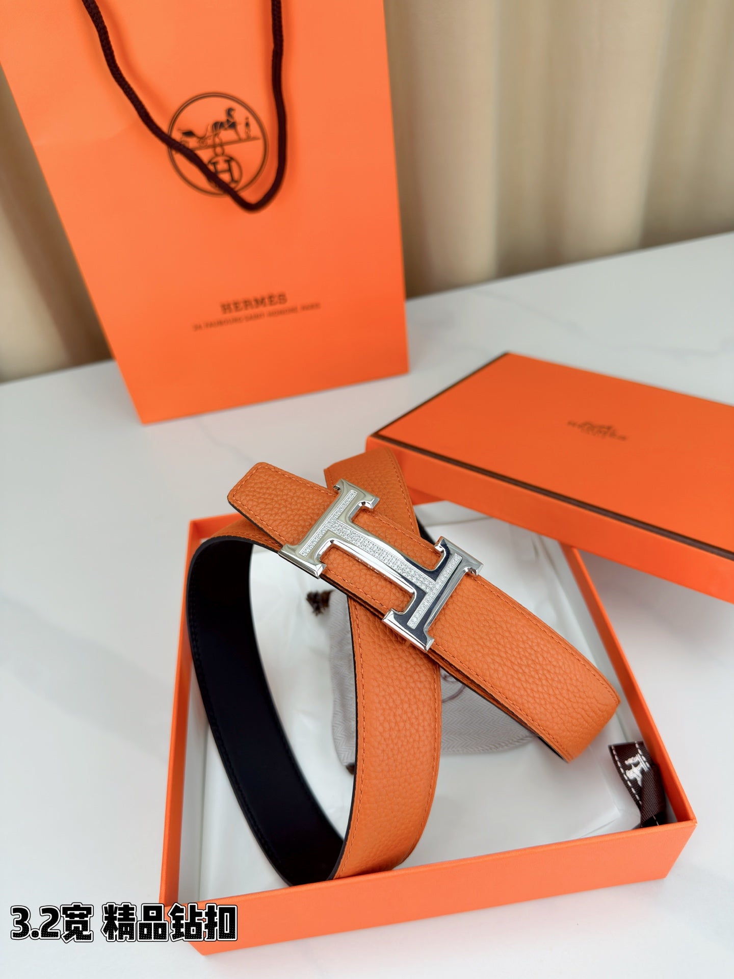 Hermes H-buckle belt, orange leather with silver H buckle and open keeper