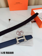 Hermes belt and dust bag with silver H buckle on dark blue strap