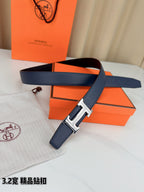 Hermes belt on dust bag with dark blue strap and silver H buckle