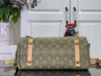 Olive monogram hobo bag with two front flap pockets and tan leather straps