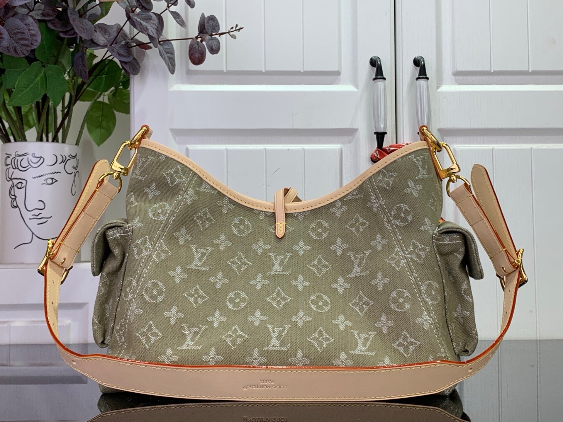 Olive monogram hobo bag with top drawstring tie and side pockets