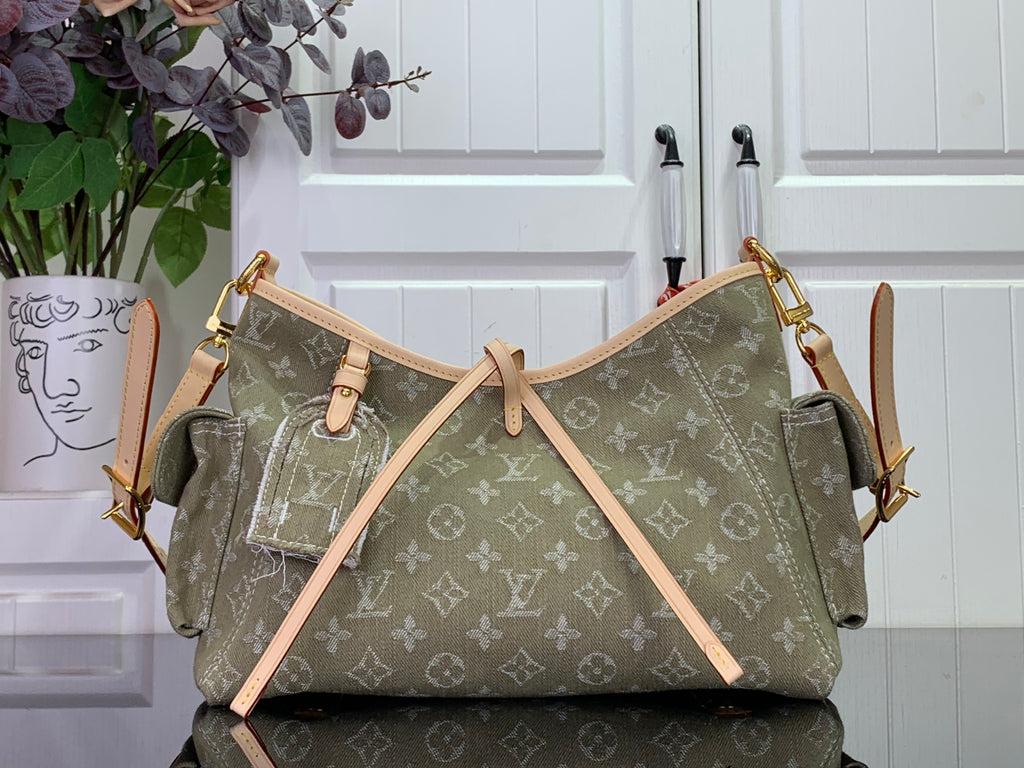 Olive monogram hobo bag with tan leather trim and top handles