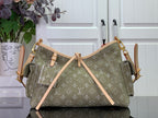 Olive monogram hobo bag with tan leather trim and top handles