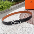 Hermes belt in dark navy leather with silver buckle and chain detail