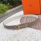 Hermes belt in taupe leather with gold-tone buckle and chain detail
