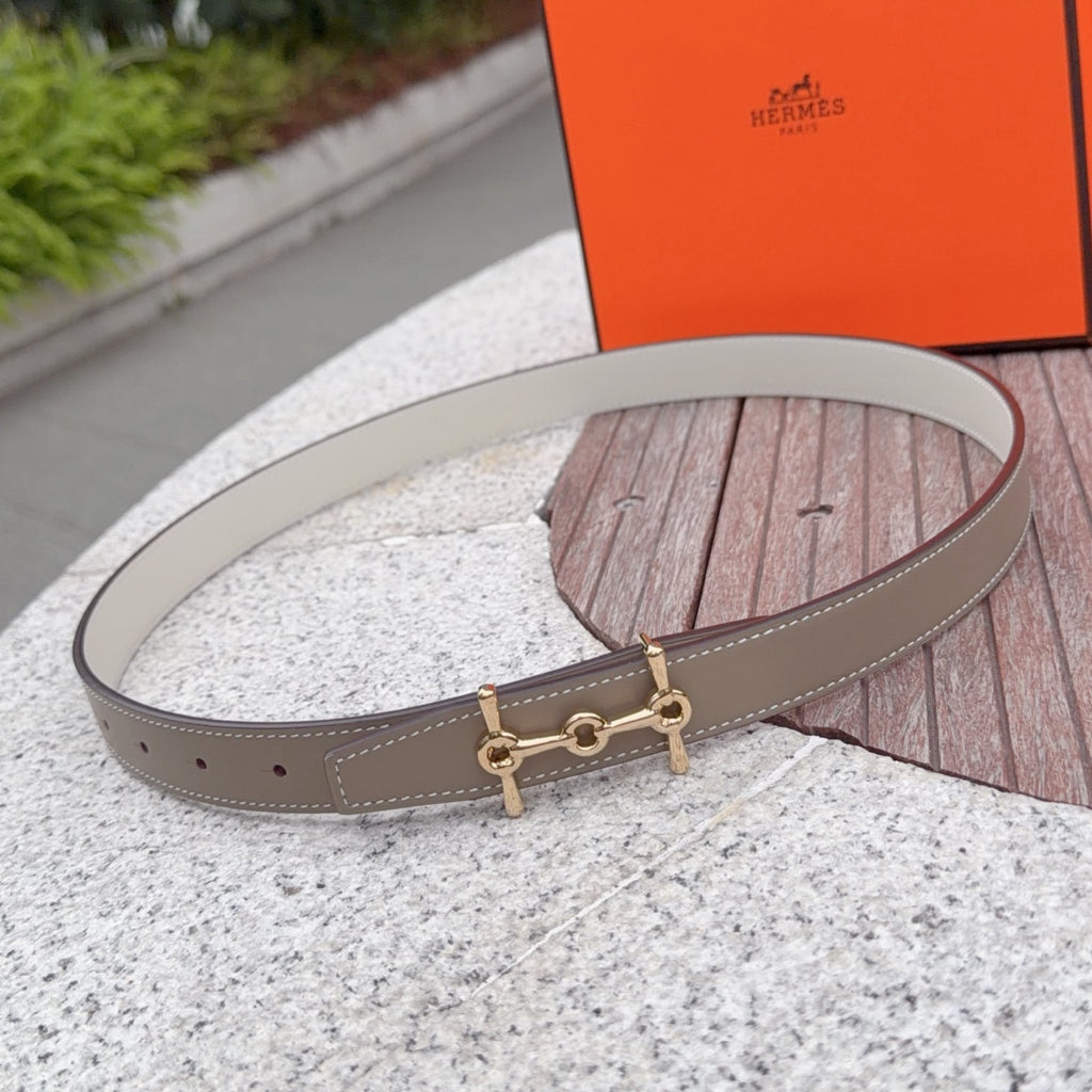 Taupe leather belt with gold-tone buckle, punched holes