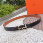 Hermes navy leather belt with gold-tone buckle and contrast stitching, center view