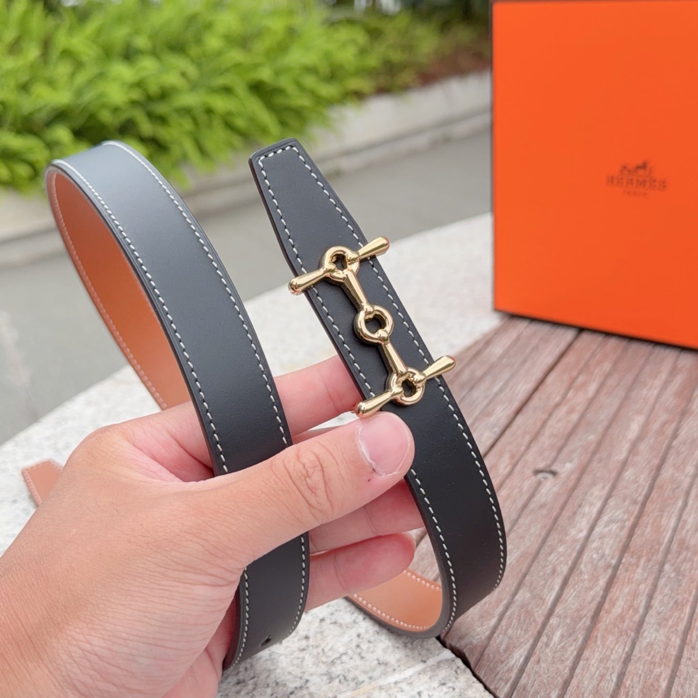 Hermes belt in gray leather with gold-tone buckle and contrast stitching