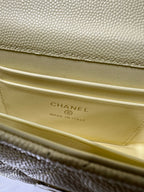 Chanel logo and Made in Italy stamp on light yellow leather flap interior lining