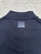 Navy polo shirt back with Louis Vuitton engraved plate at the neck
