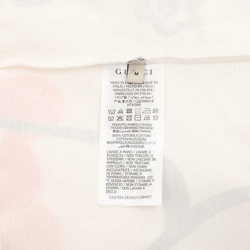 White Gucci T-shirt care label with printed size and instructions