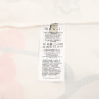 White Gucci T-shirt care label with printed size and instructions