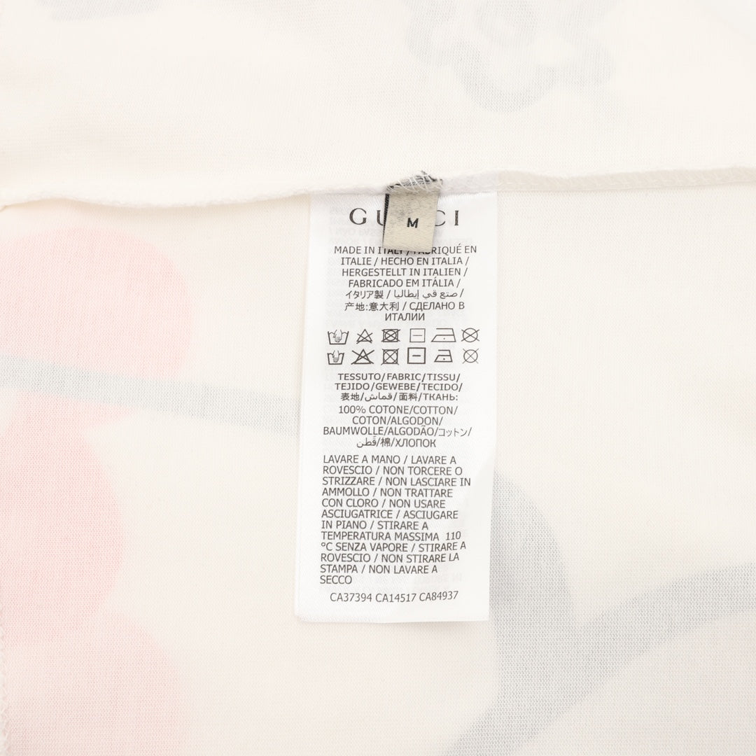 White Gucci T-shirt care label with printed size and instructions
