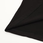 Black T-shirt sleeve hem with visible stitching