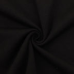 Black T-shirt fabric close-up with textured knit surface