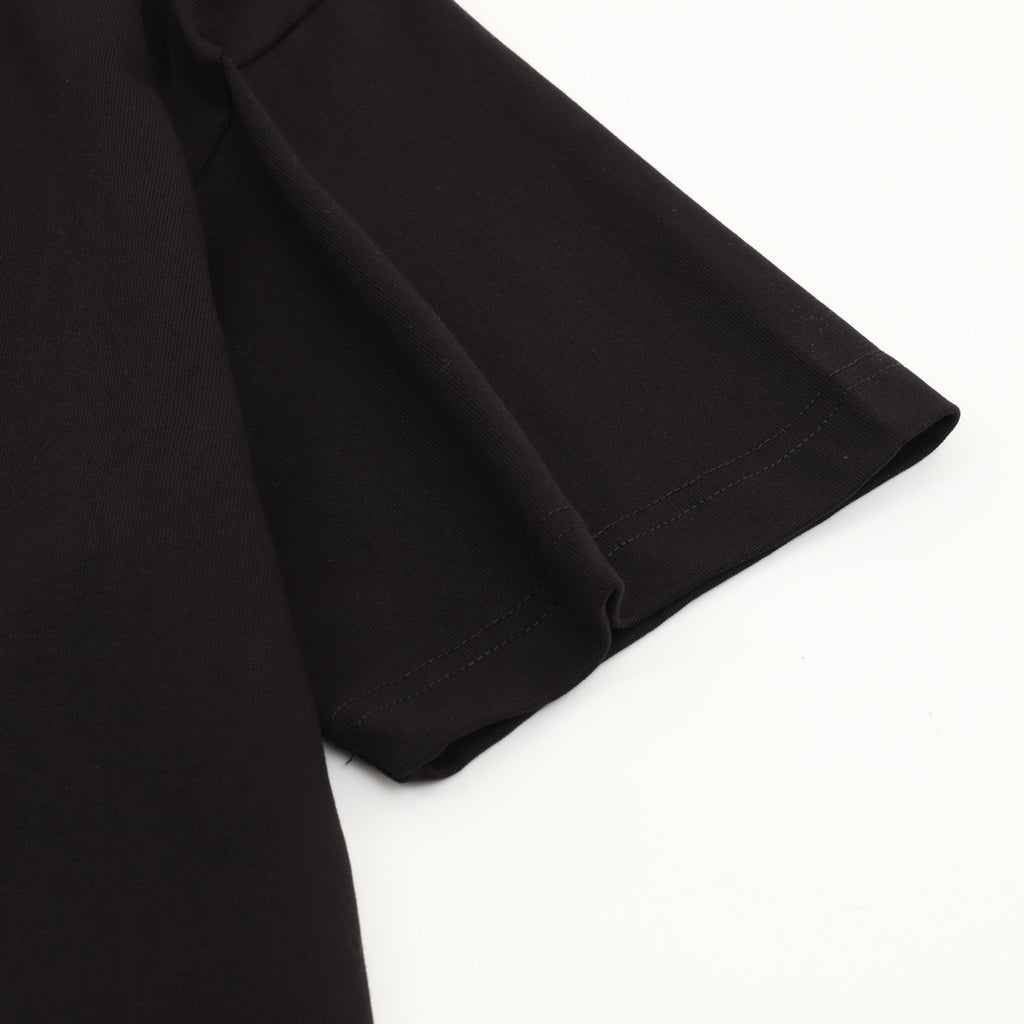 Black T-shirt sleeve and side hem detail