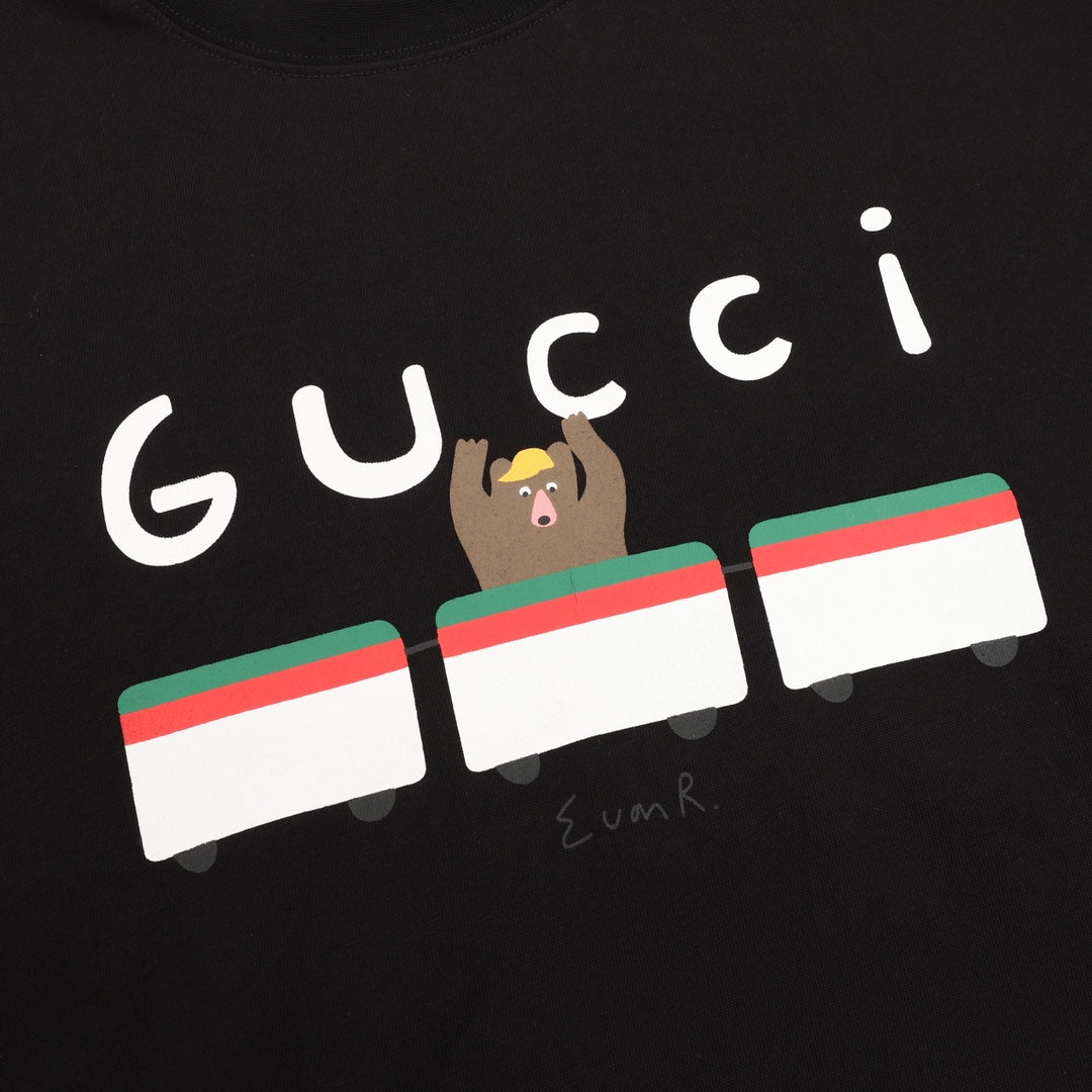 Black short-sleeve T-shirt with large Gucci logo and bear graphic