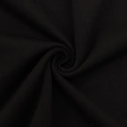 Black T-shirt fabric closeup with fine knit texture
