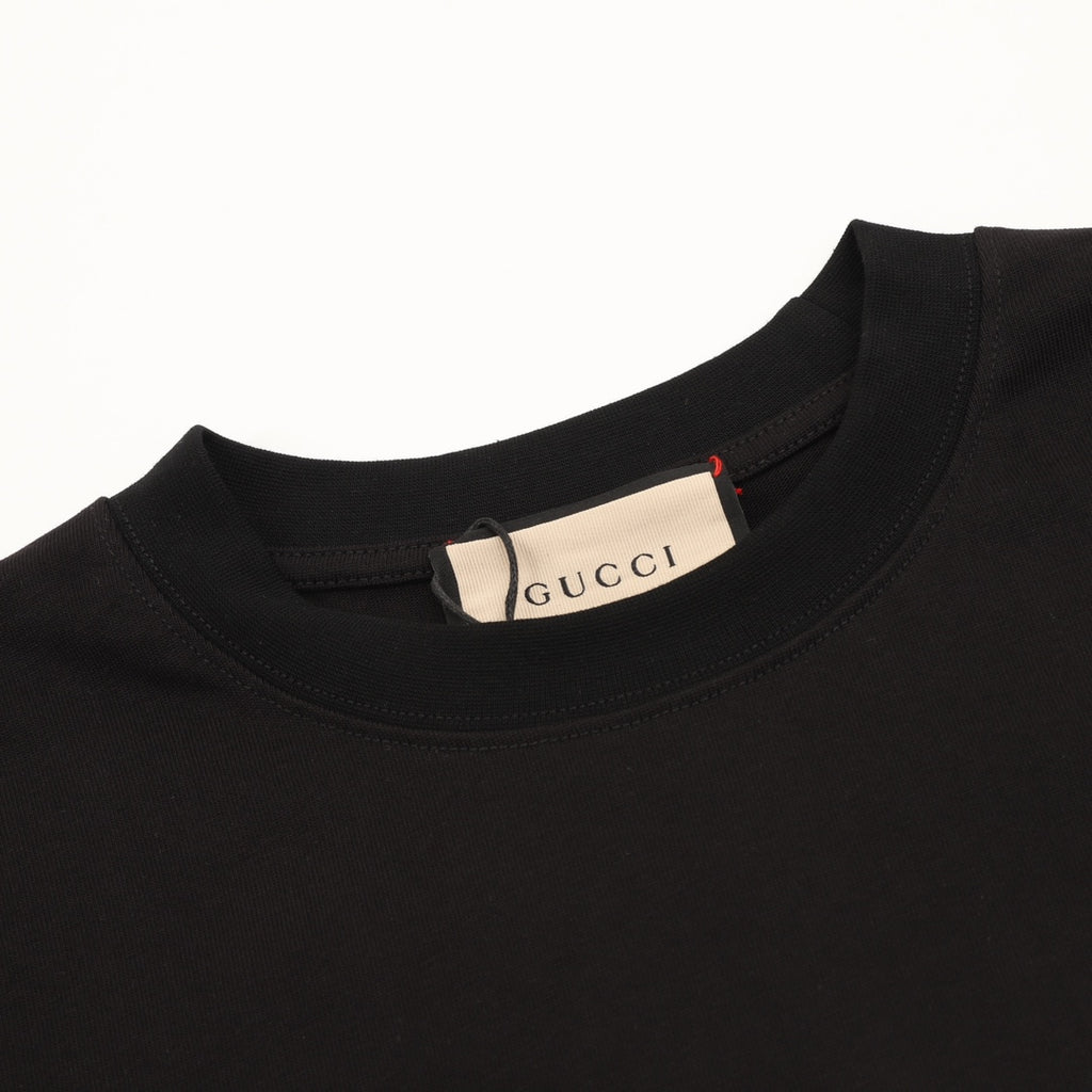 Black short-sleeve T-shirt neckline with Gucci brand label at collar