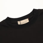 Black short-sleeve T-shirt neckline with Gucci brand label at collar