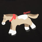 Black T-shirt with dog graphic and red Gucci lettering