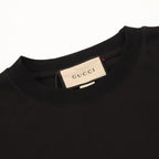Black short-sleeve T-shirt neckline with Gucci brand tag