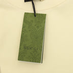 Gucci short-sleeve T-shirt, pale yellow with green Gucci hang tag