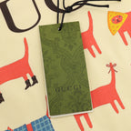 Kids pale yellow T-shirt with hanging Gucci tag and dog print