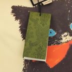 Gucci short-sleeve T-shirt with hanging tags on the black cat graphic