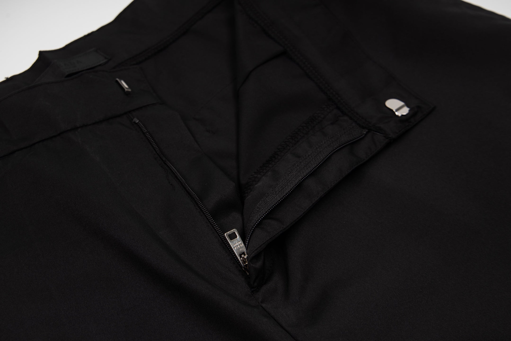 Prada black shorts with front zipper and inner pocket