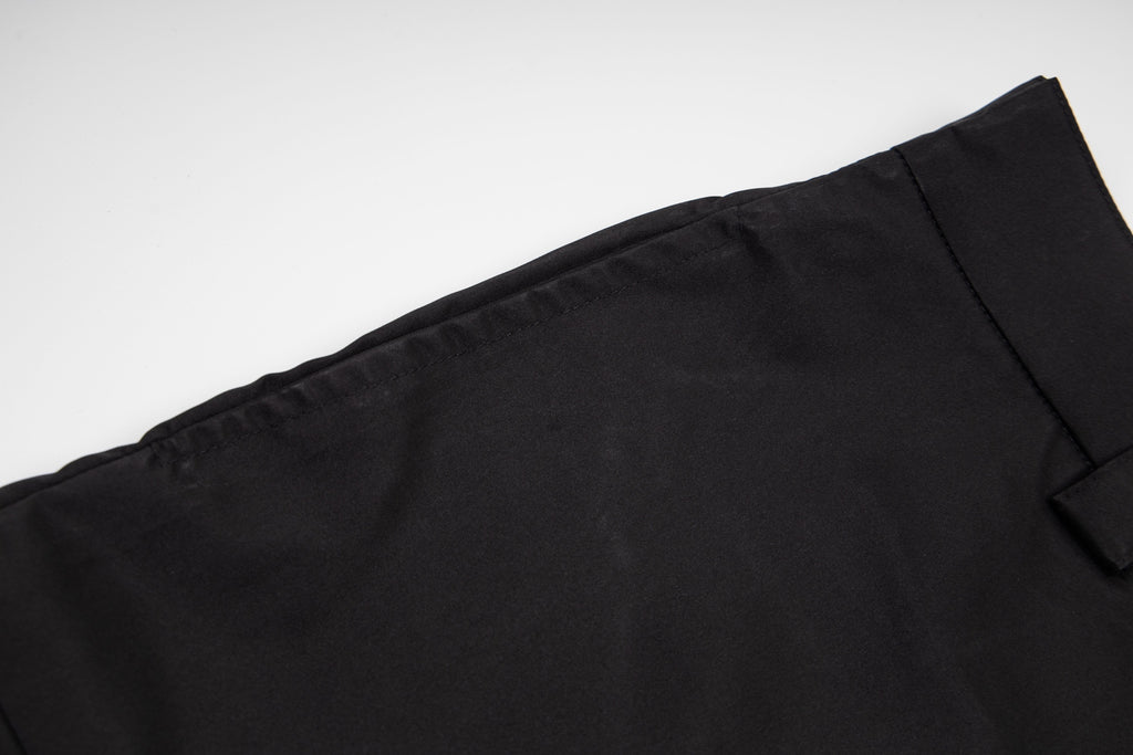 Prada black shorts fabric with clean hem and seam
