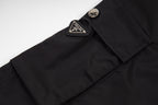 Prada black shorts with leather logo patch near waistband