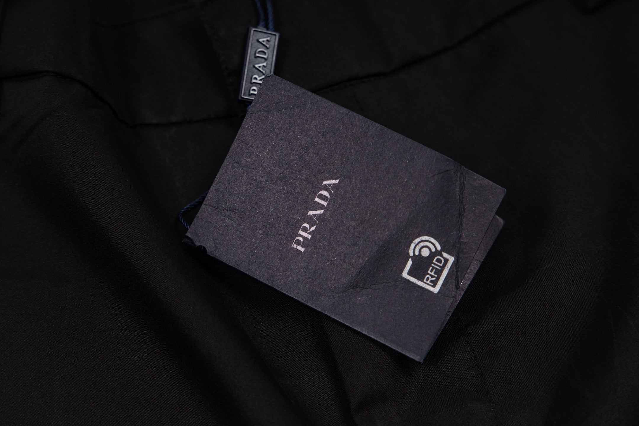 Prada black shorts with PRADA hang tag and logo label