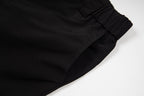 Black cargo shorts hem with clean side seam finish