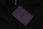 Prada black pants fabric tag on waistband area