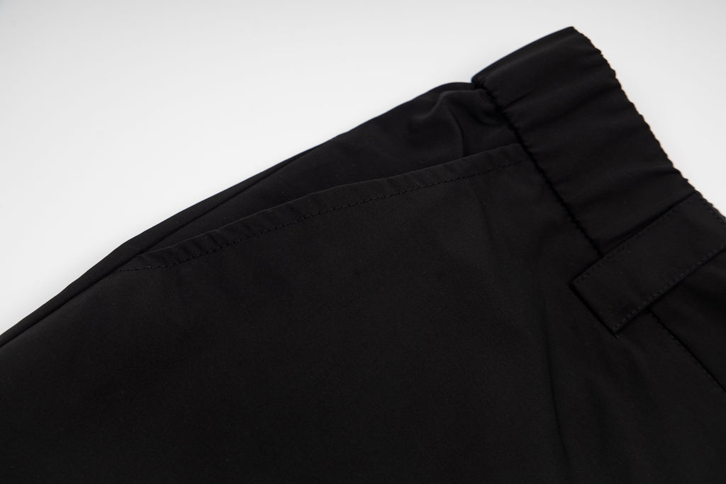Black cargo shorts with stitched waistband and top button detail