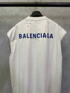 White short-sleeve T-shirt with large blue BALENCIAGA text on the back