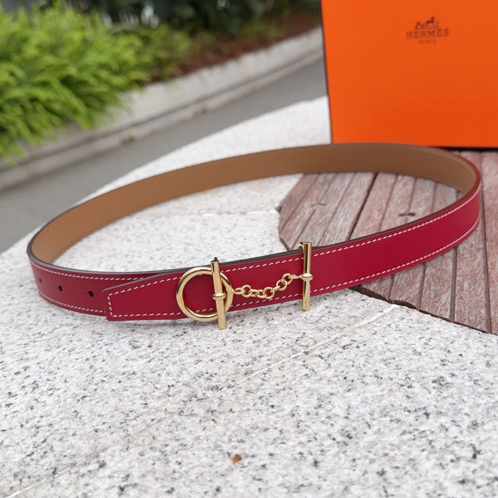 Red leather belt with gold buckle and chain link, tan reverse, stitched edges