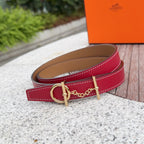 Red leather belt with gold buckle and chain link, tan lining, side view