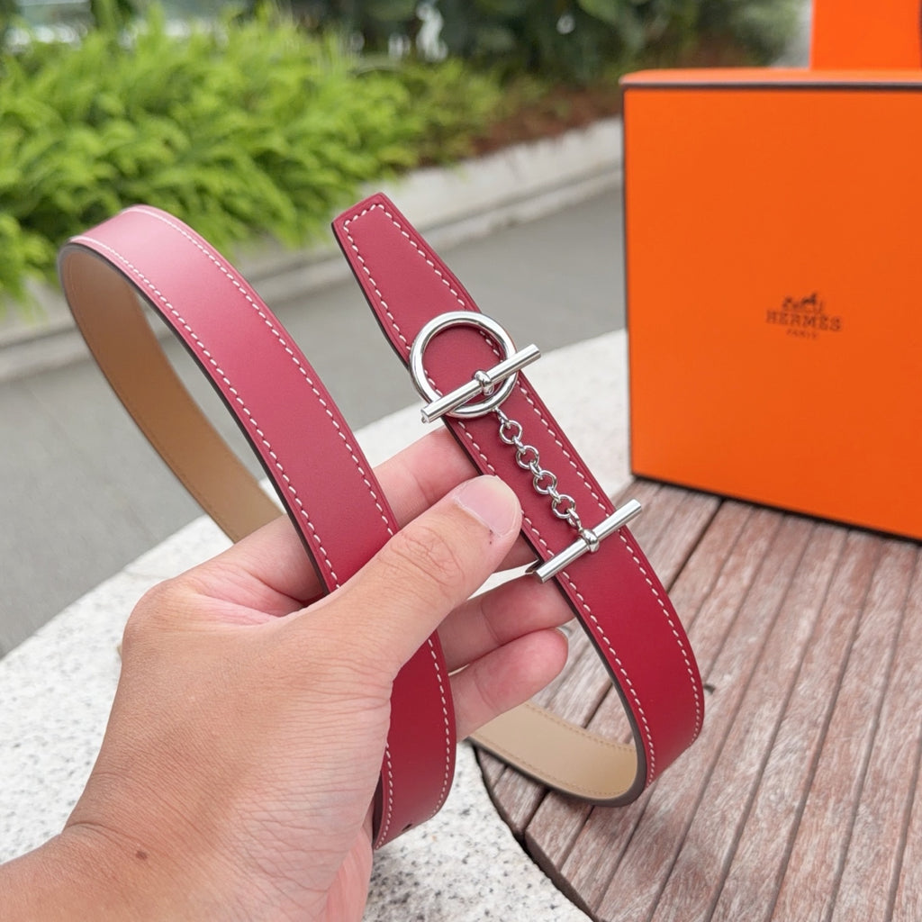 Hermes belt with burgundy leather strap, silver buckle, chain and tan interior