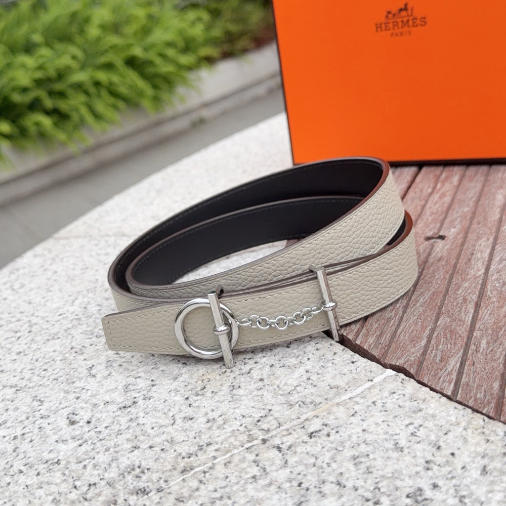 Hermes belt with light beige strap, silver buckle and interlinked chain