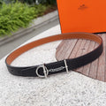 Hermes belt in dark textured leather with silver buckle and chain detail