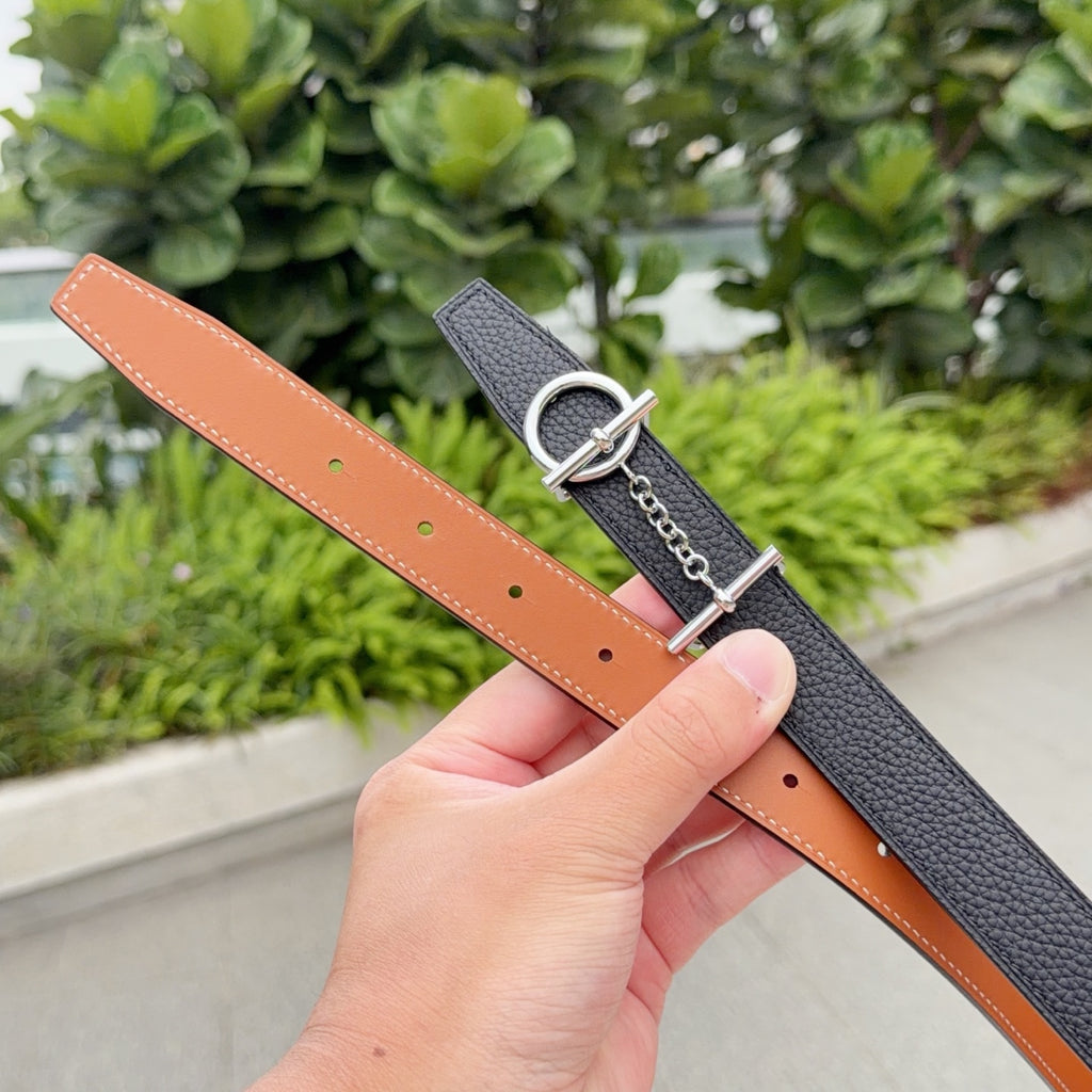 Hermes belt underside in tan leather with punched holes and silver buckle