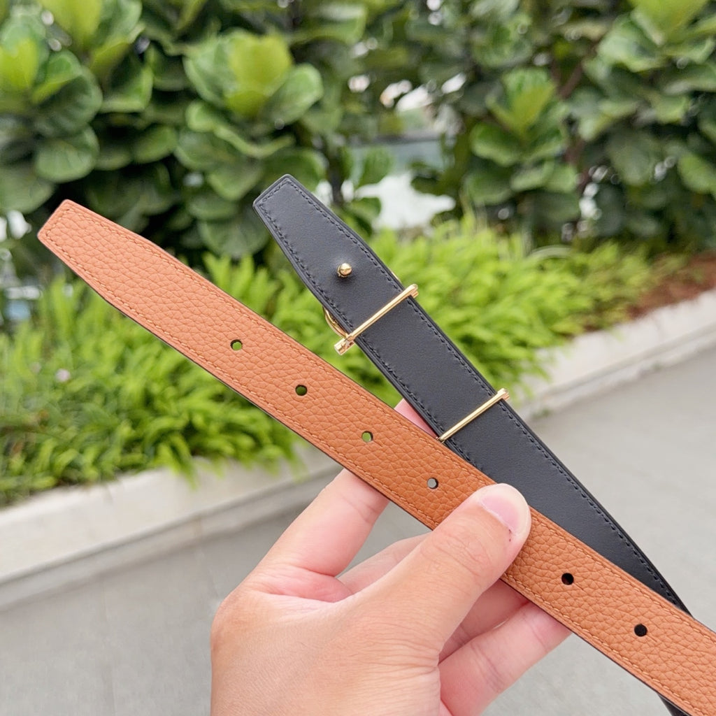 Two-tone leather belt set: orange and dark with gold buckle and eyelets