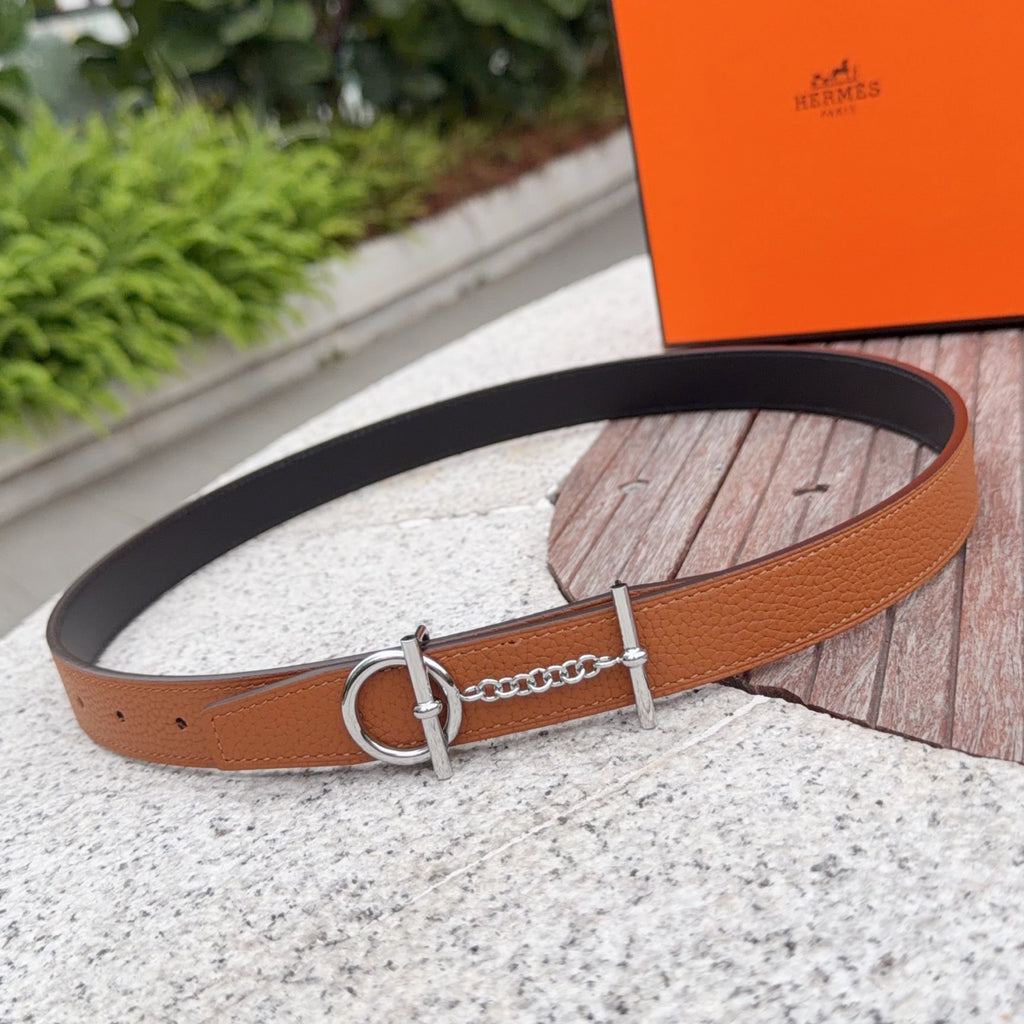 Hermes leather belt with tan strap, silver buckle ring, and chain detail