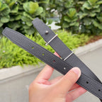 Hermes belt adjustable strap with dark leather and silver-tone buckle bar